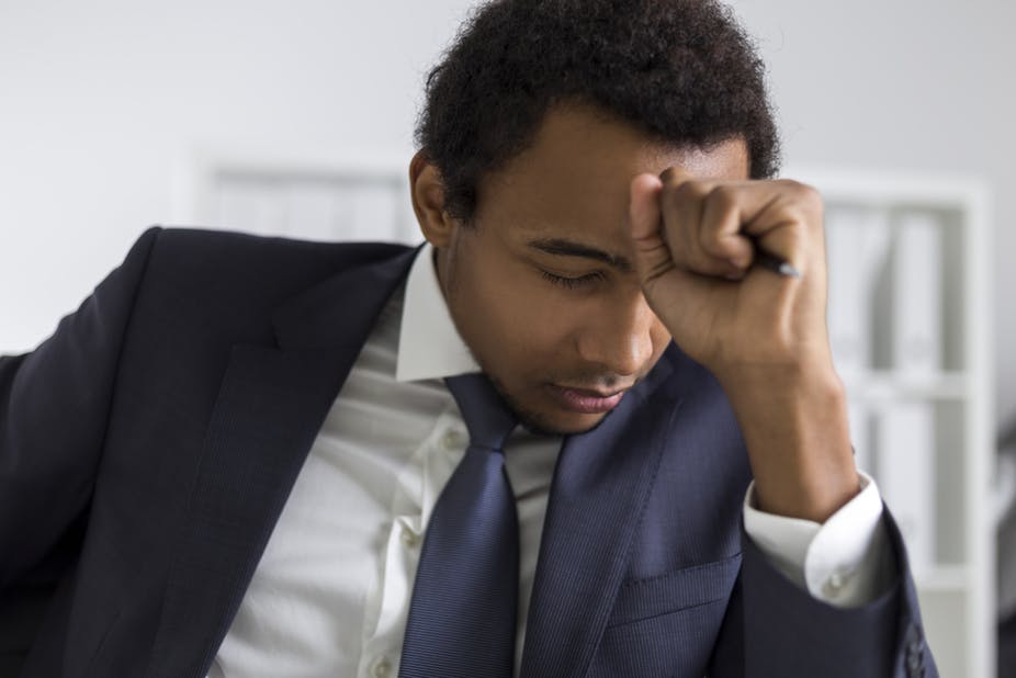 A man in a business suit clearly disappointed about something.  Source: https://images.theconversation.com/files/172723/original/file-20170607-11305-yeecef.jpg