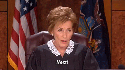 Judge Judy saying 'next', with a confused look on her face.